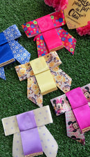 Conjunto- 5 U de gargantilha + 10 U de laço